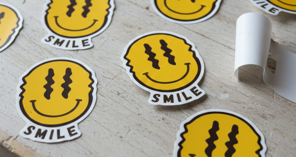 professionally printed fun yellow smiley face stickers