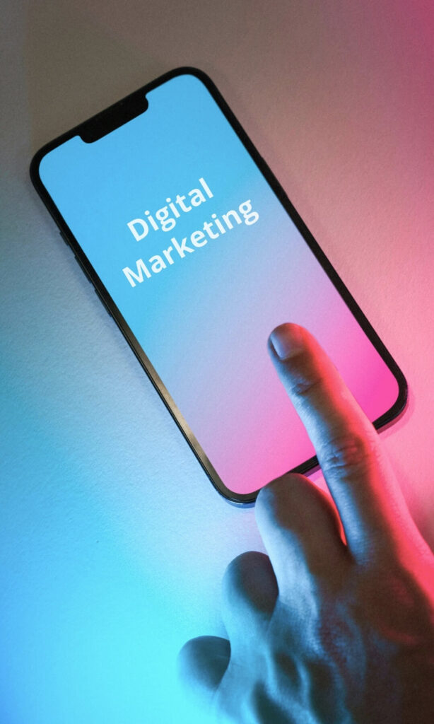 iPhone with the words digital marketing displayed on screen