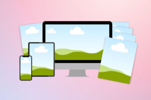 digital product mockup of computer, laptop, mobile devices and paper with pink background