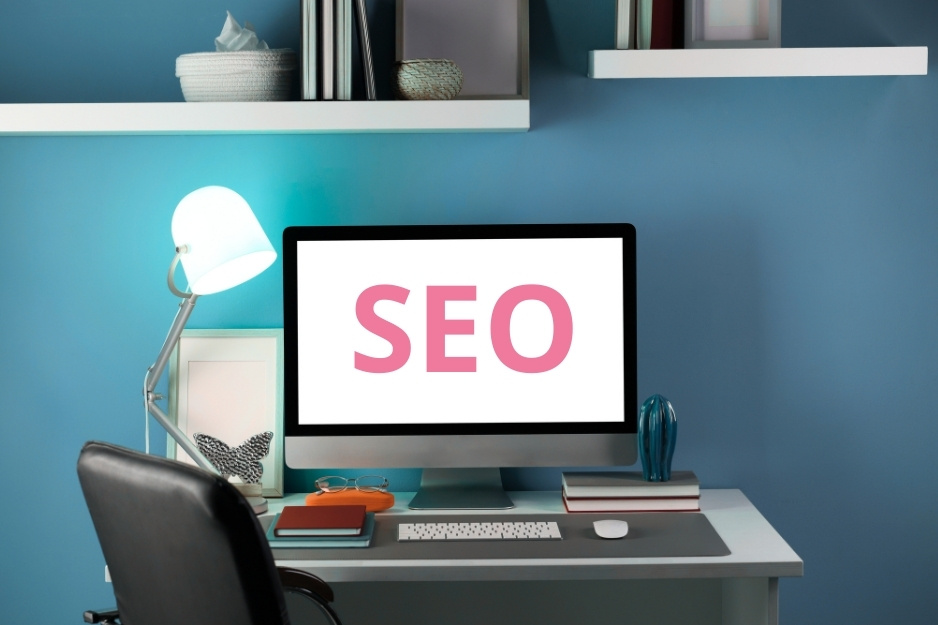 computer on a desk with SEO displayed on the screen