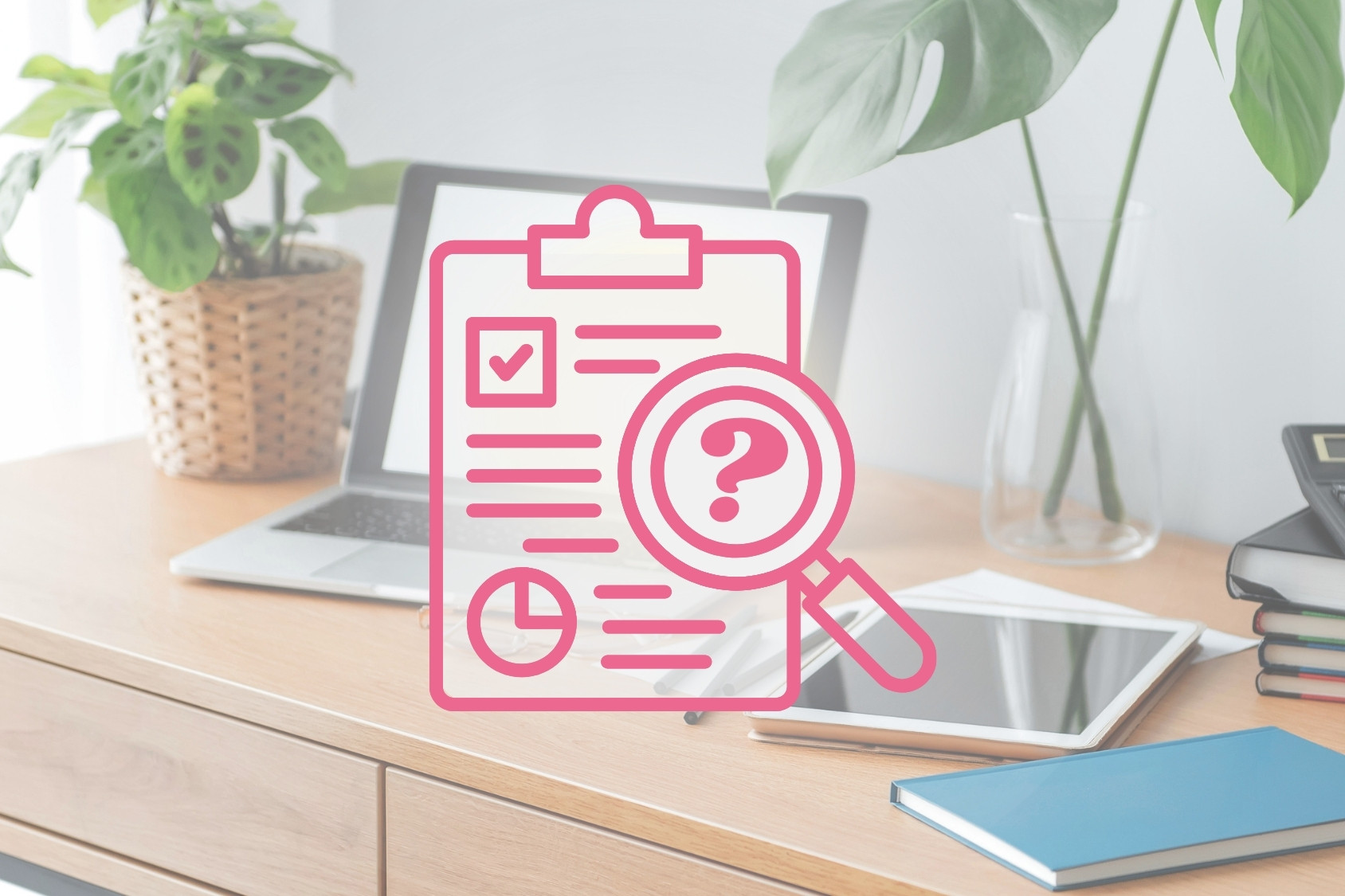 icon of an audit over a laptop on a desk