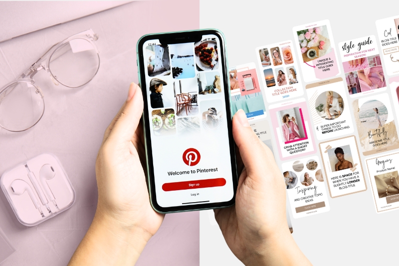 person holding phone with pinterest homepage showing